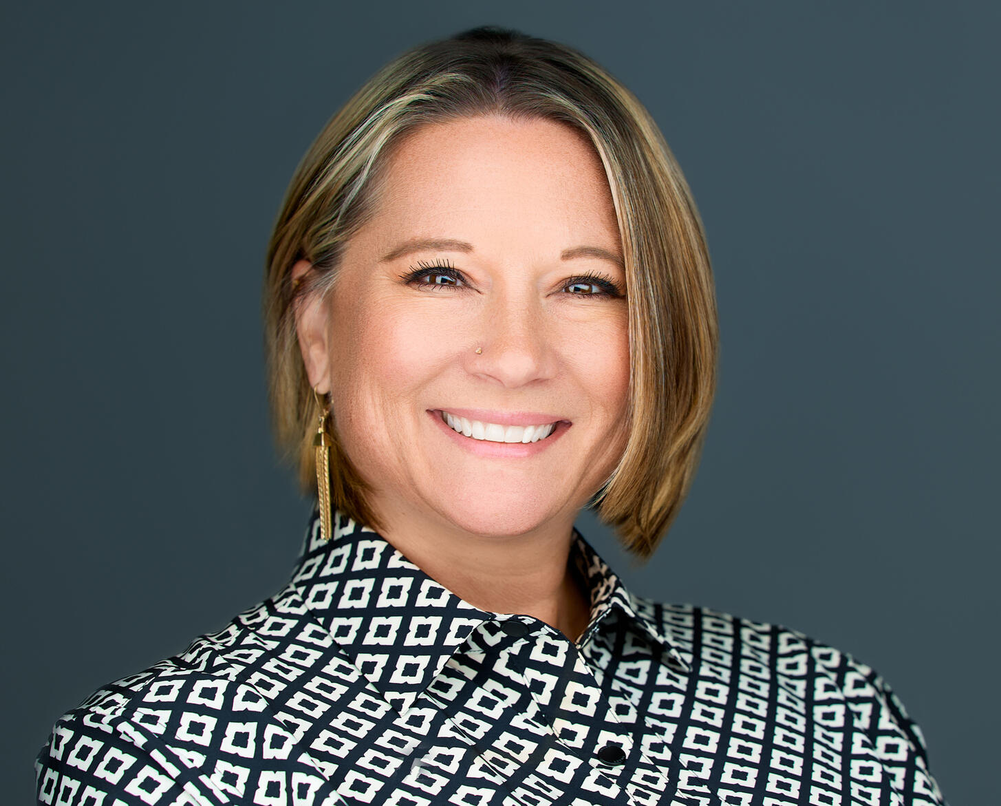 Kris Fores Owner of Kris Flores Insurance Solutions LLC Headshot of Kris Fores Owner of Kris Flores Insurance Solutions LLC, wearing a green top with shoulder length hair of fair blond color.